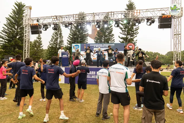 Participants dancing in front of the stage