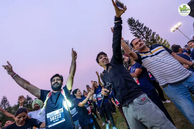 Participants taking a selfie at sunrise