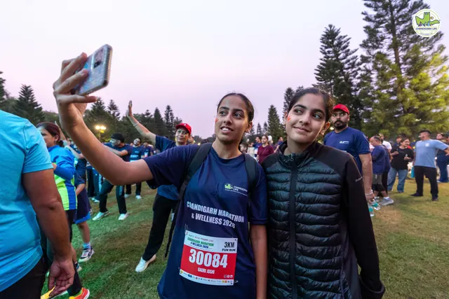 Two young women taking a selfie at the start