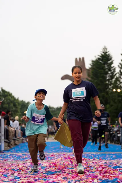A mother and son finishing together