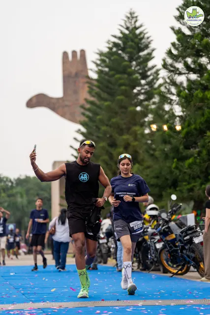 A man giving a thumbs up as he finishes