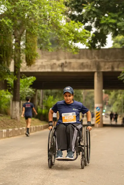 A wheelchair racer under the underpass