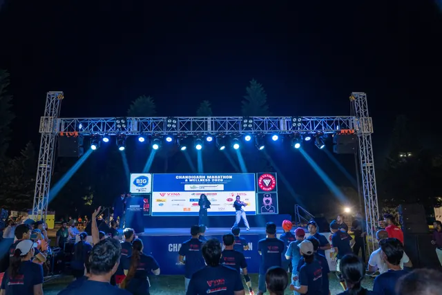 The crowd in front of the lit stage