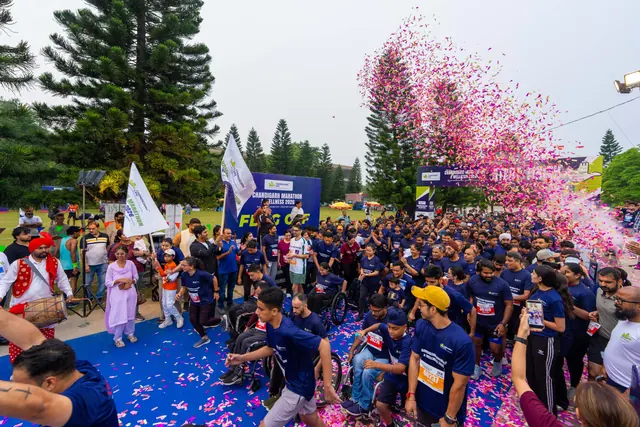 Confetti over the crowd at the flag-off
