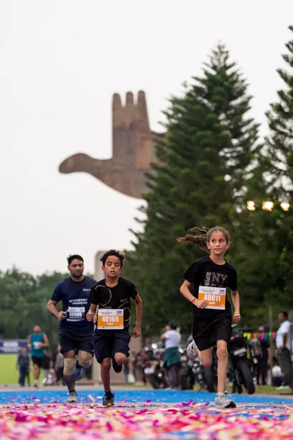 Two children finishing together
