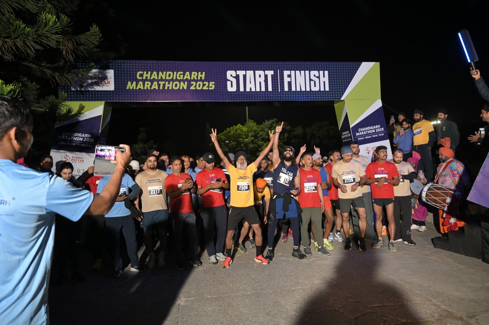 Runners on the Capitol Complex start line before dawn at Edition I (2025)